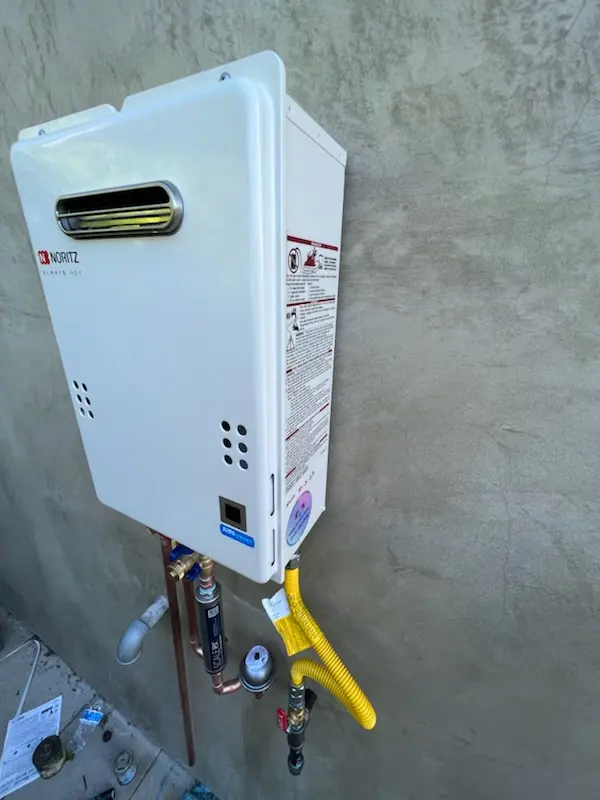Tankless water heater installation for Willow Meadows - Willowbend homes
